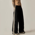 Men's black wide-leg climbing trousers with high waist and straight leg design
