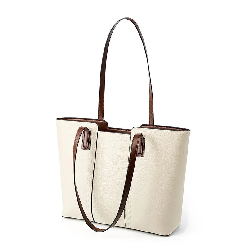 Women's genuine leather crossbody commuter bag with multiple interior compartments in horizontal square design
