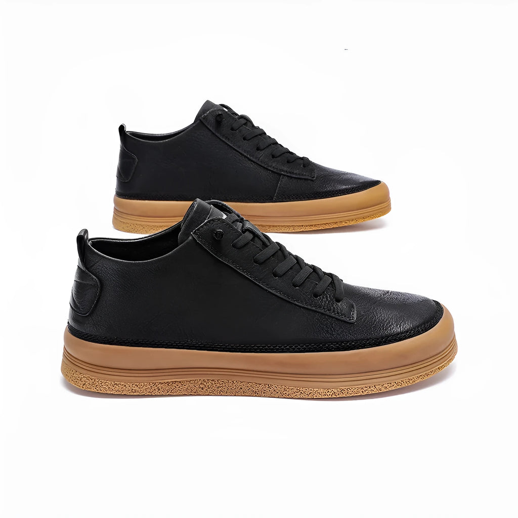 Men's black leather casual shoes with round toe and flat rubber sole on white background