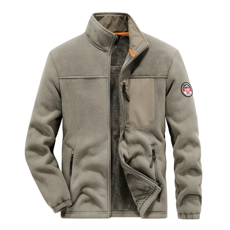 Man wearing a solid-colour fleece cardigan jacket with zipper pockets, shown in gray.
