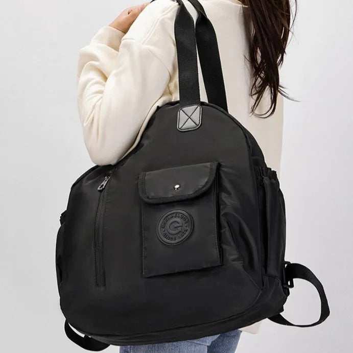 Women's large nylon outdoor backpack with sandwich pocket in black, green letters, or khaki