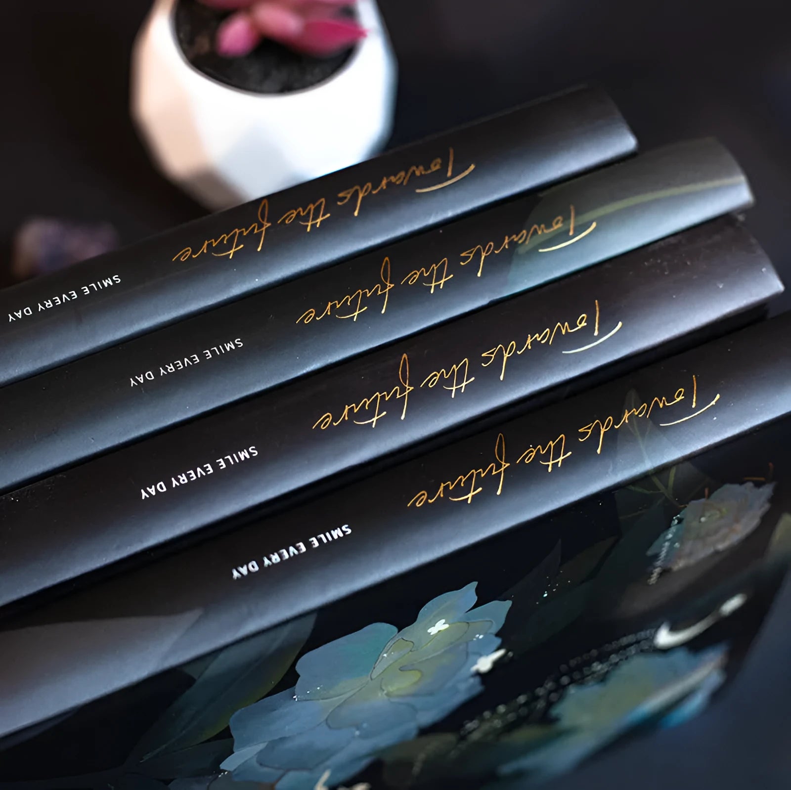 A5 notebook with luminous cover and colour-illustrated pages in four colour options