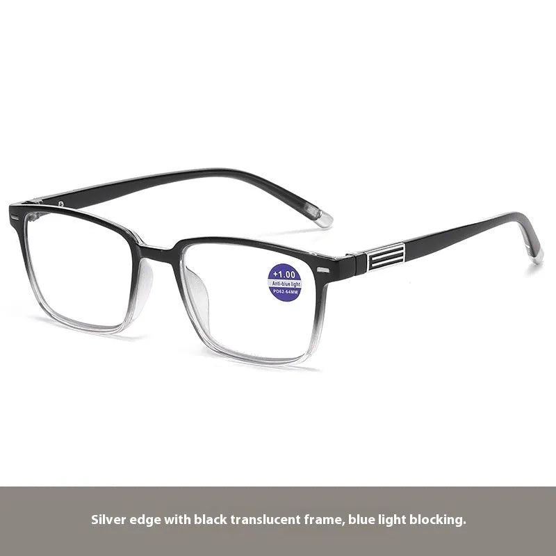 A pair of multifocal reading glasses with colour-changing lenses and an anti-blue light filter on a table.