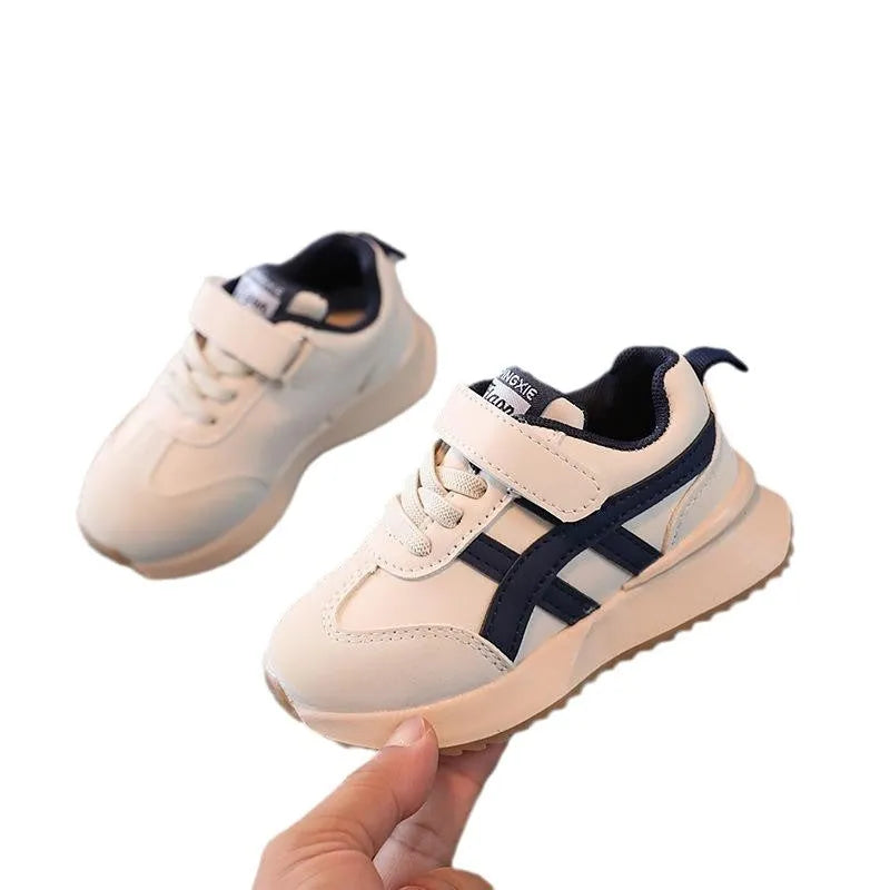 Children's white synthetic leather sneakers with Velcro strap and rubber sole in size 25