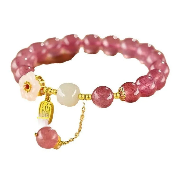 Handmade Hetian jade peach blossom strawberry quartz crystal bracelet for women showing strawberry quartz pearl and charm details