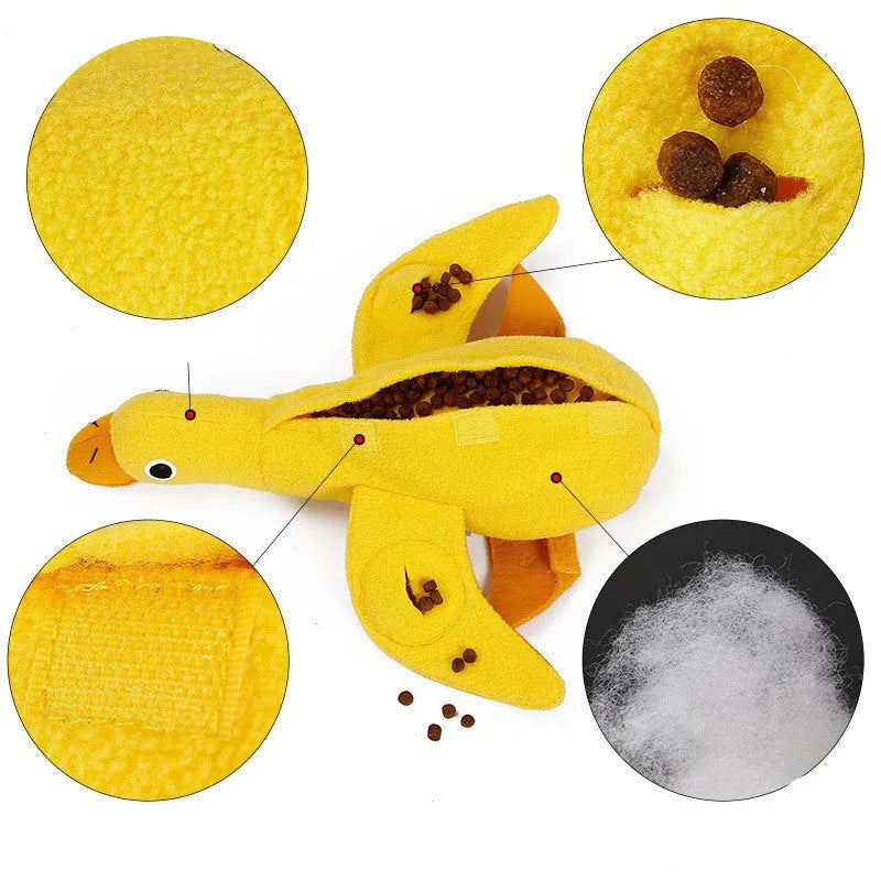 Yellow plush duck dog training toy with squeaker and treat dispensing features