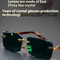 Frameless dark green crystal sunshade glasses with protective case and cleaning cloth