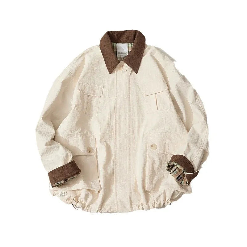 Green casual jacket with contrast trim and side seam pockets on a hanger