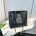 Contrast colour PU leather tote bag showing internal organisation compartments and external slit pocket