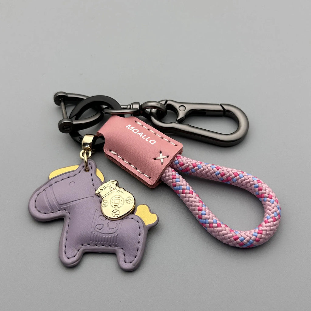 Handmade cowhide leather key ring pendant with zinc alloy pony buckle and coloured flanelle rope.