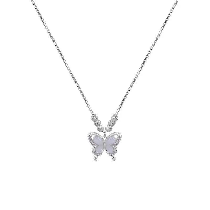 Silver opal butterfly pendant necklace on a cross chain, adjustable 41-50cm, made of 925 sterling silver.