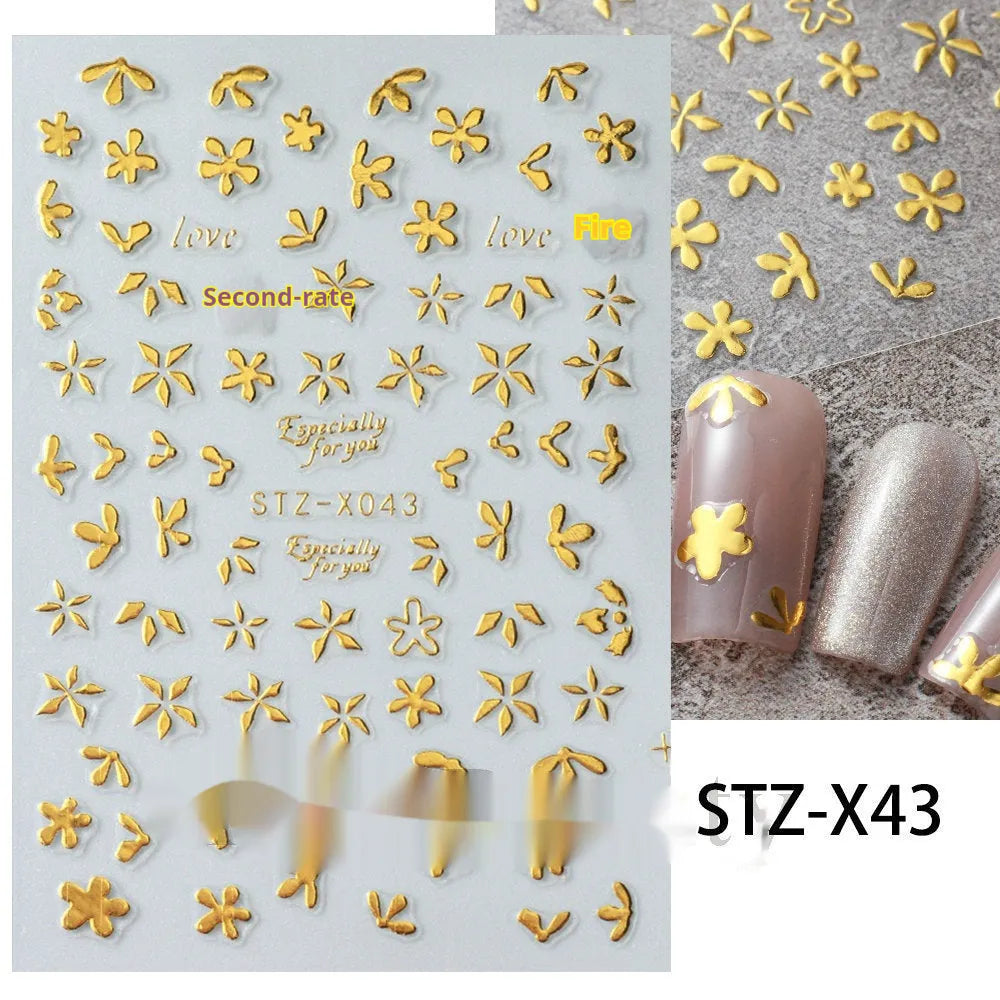 Nail art sticker sheet showing cartoon love pattern designs in black and silver strips