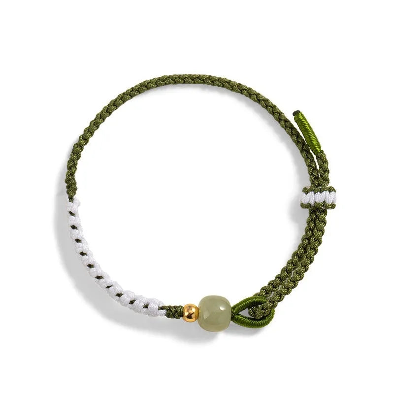 Chinese national bracelet with colourful cord carrying strap and electroplated sterling silver fittings