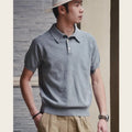 Retro slim fit short-sleeved cotton t-shirt in dark brown, shown on a model.