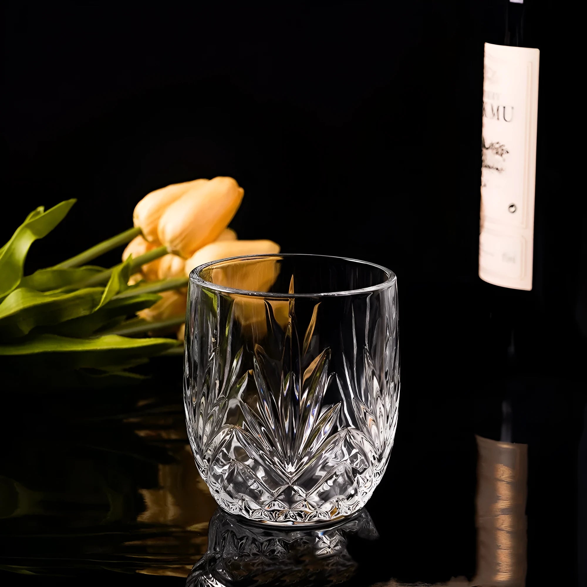 Thick bottom crystal whiskey shot glass with 350ml capacity on a table.