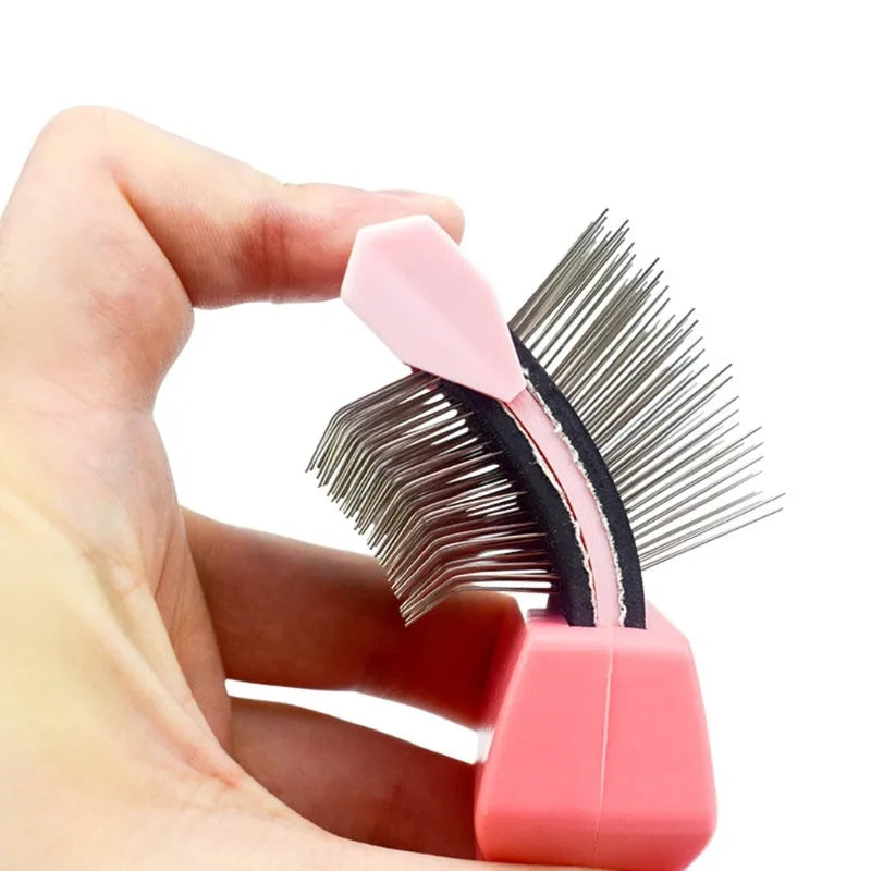 Double-sided pet brush with stainless steel pins on one side and softer pins on the other, in blue colour