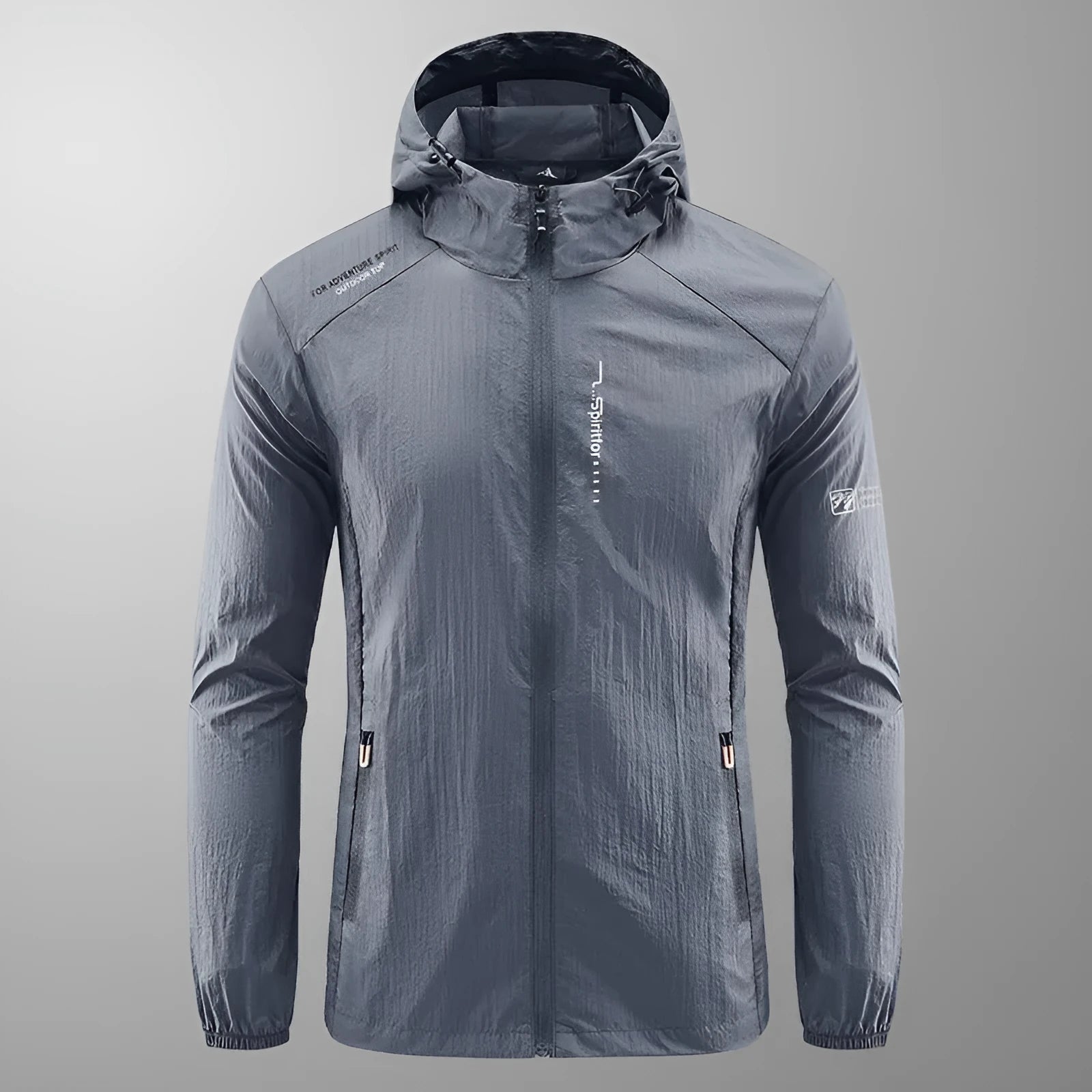 Man wearing a lightweight grey hooded summer jacket made from thin nylon fabric.