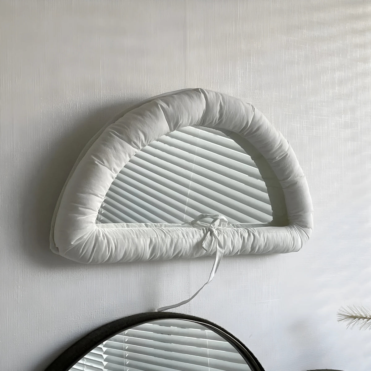 Rectangular wall mirror with soft cotton-filled fabric background in modern simplicity style