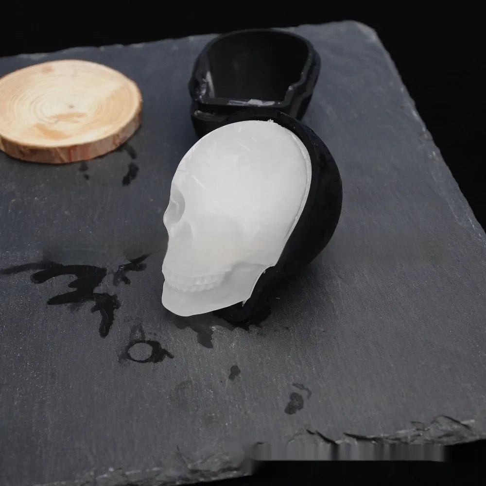 3D Halloween skull ice cube tray made from food-grade silicone, showing detailed skull cavities.
