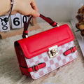 Retro ethnic pattern crossbody bag in horizontal square shape with file compartment.