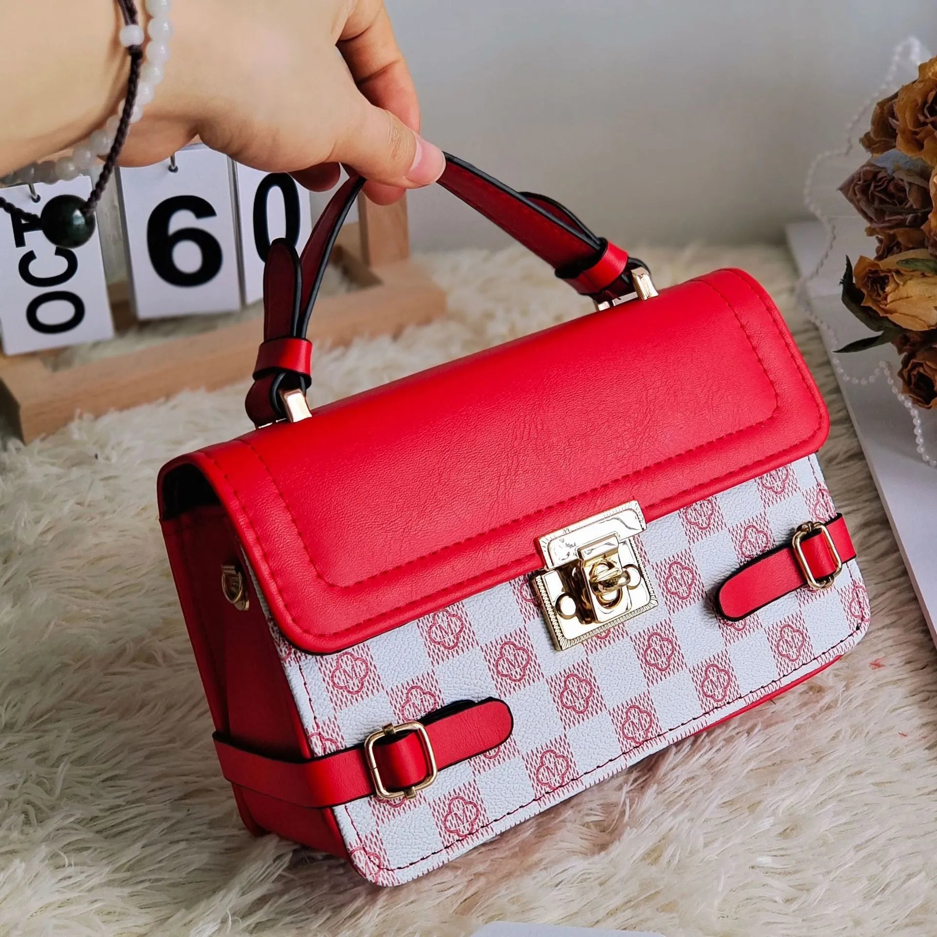 Retro ethnic pattern crossbody bag in horizontal square shape with file compartment.
