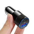 Compact black aluminium alloy mobile phone car charger for vehicle 12V socket.