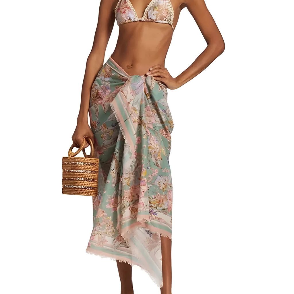 Women's creamy-white floral bikini set with matching skirt in nylon fabric