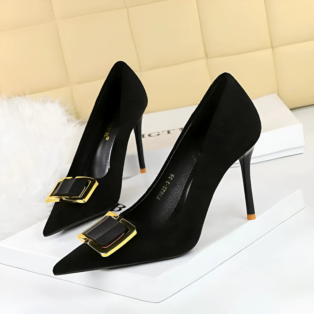 Black suede women's stiletto high heels with a pointed toe and 9cm heel on a rubber sole.