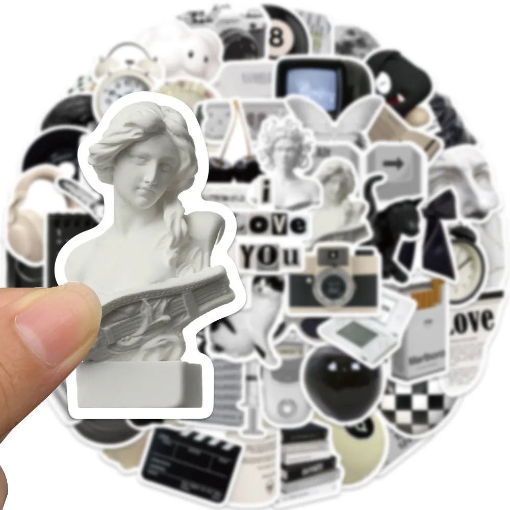 61-piece pack of black and white simple style PVC waterproof stickers for laptops and phones.