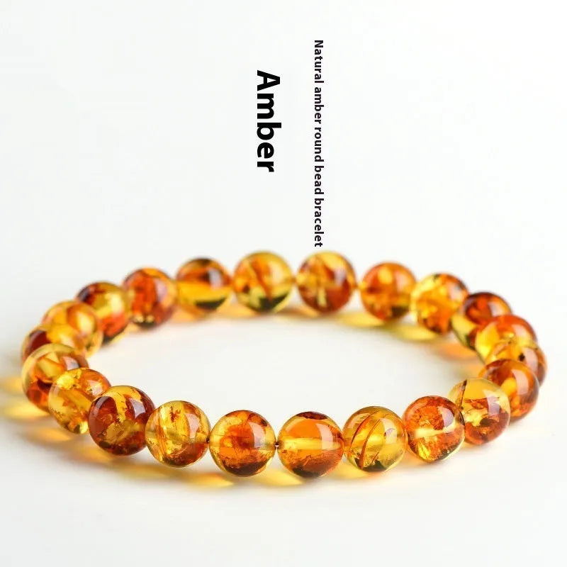 Natural yellow piebald amber water purification bracelet with geometric beads