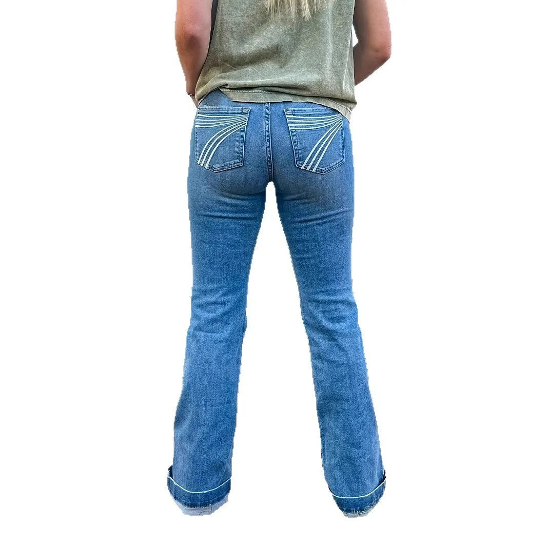 Slim fit jeans with embroidery detailing and slightly flared legs in blue denim