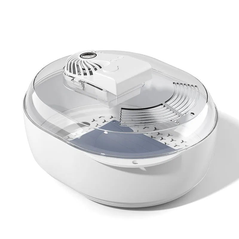 Aluminium household food defrosting plate with USB cable on a kitchen countertop.