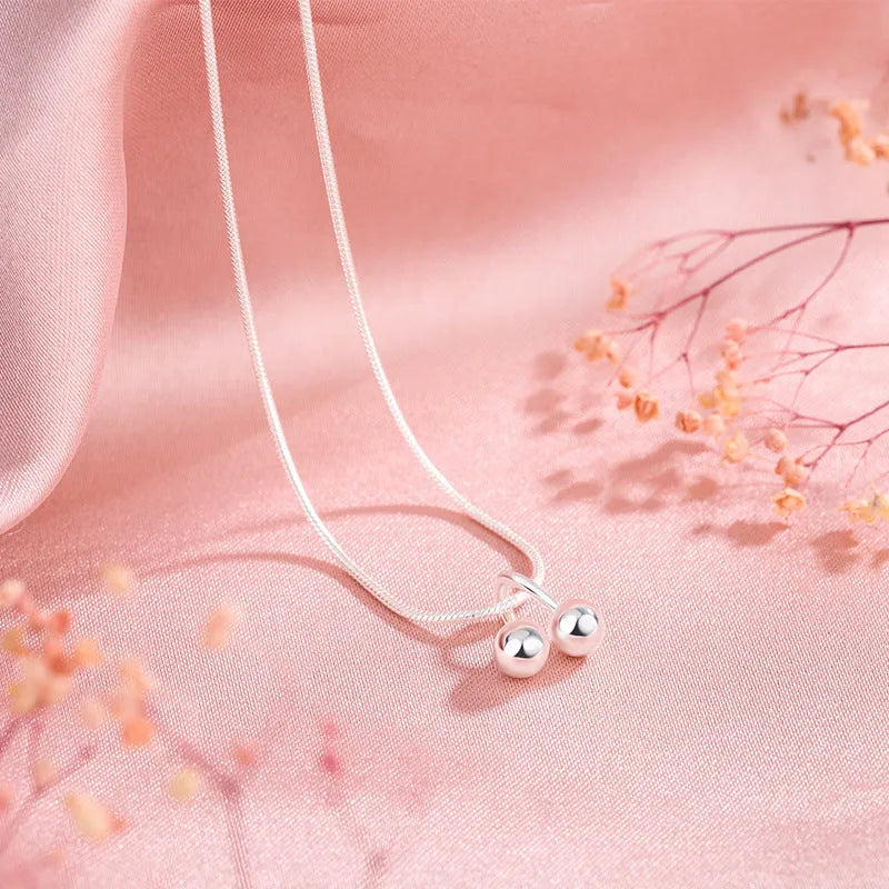 S925 sterling silver cherry necklace on adjustable snake bone chain for women.