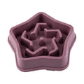 Yellow plastic dog slow feeding bowl with textured bottom surface for choking prevention