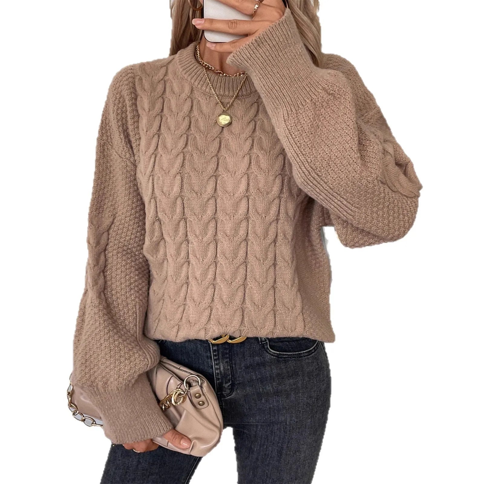 Women's beige casual sweater with twist detail and round neckline on hanger