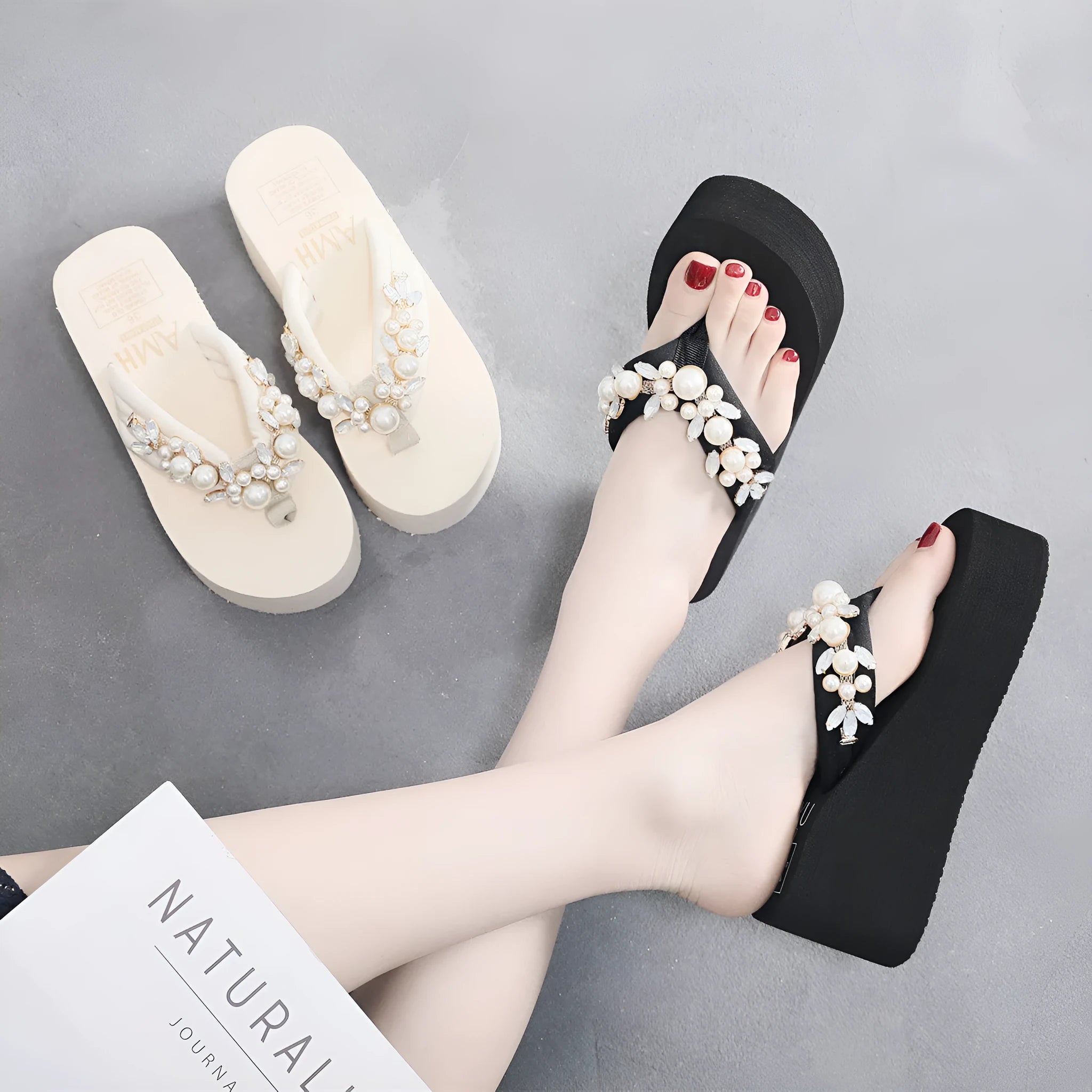 Women's black cotton high-heeled flip-flop sandals showing elevated sole and cloth upper