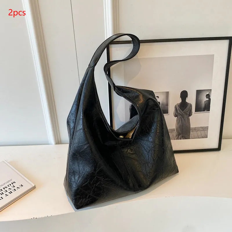 Casual soft leather shoulder bag with large capacity and sandwich pocket design