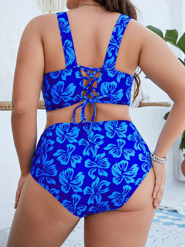 Blue floral print women's two-piece bikini swimsuit on a hanger, plus size range.