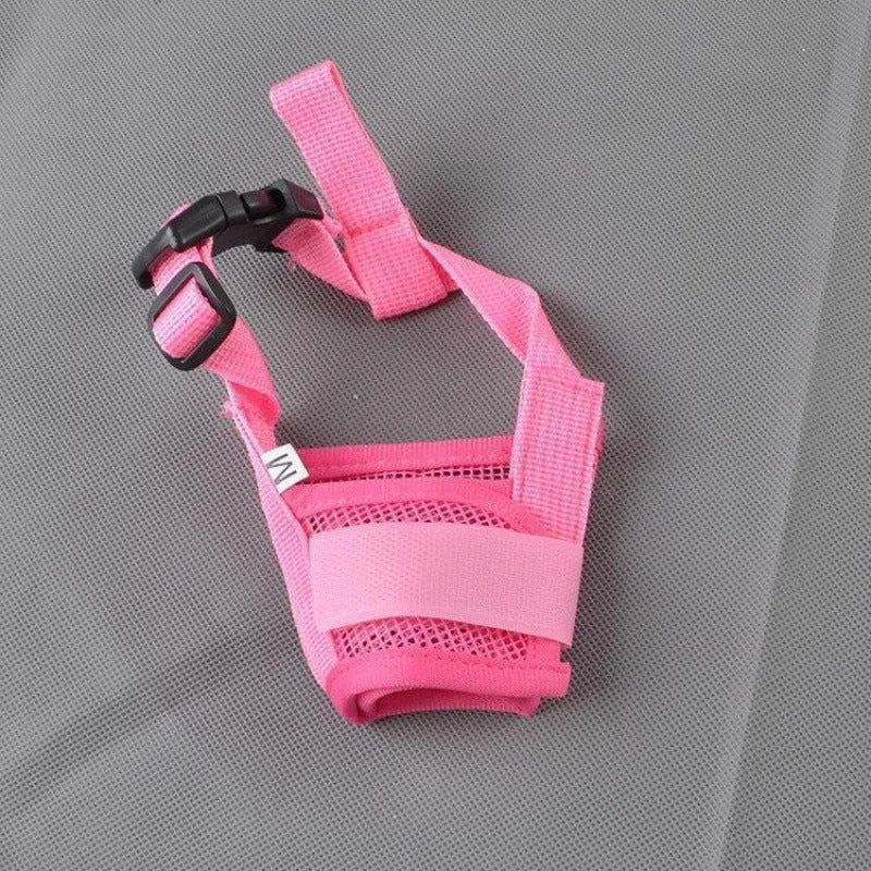 Adjustable plastic dog muzzle shown in multiple colours on a size chart from S to XXL.