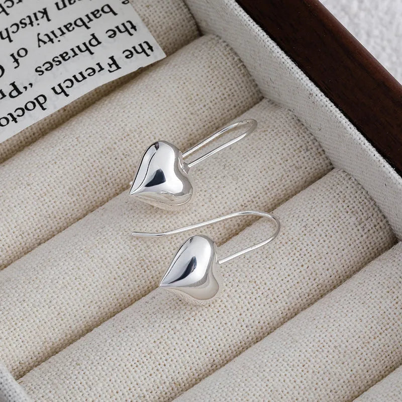 Korean style 3D glossy heart-shaped women's earrings with white gold colour finish