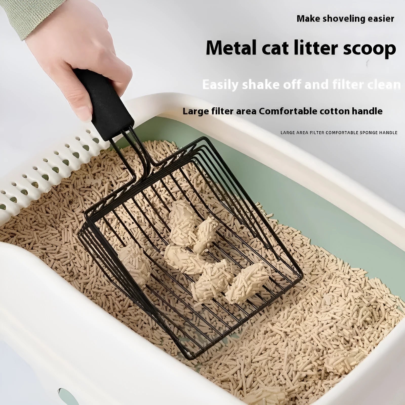 Black metal cat litter scoop with 0.8cm gap between tines for pet waste cleaning