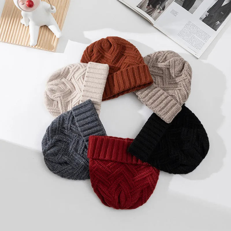 Wool knitted dome crown women's hat in six colour options showing totem patterning detail