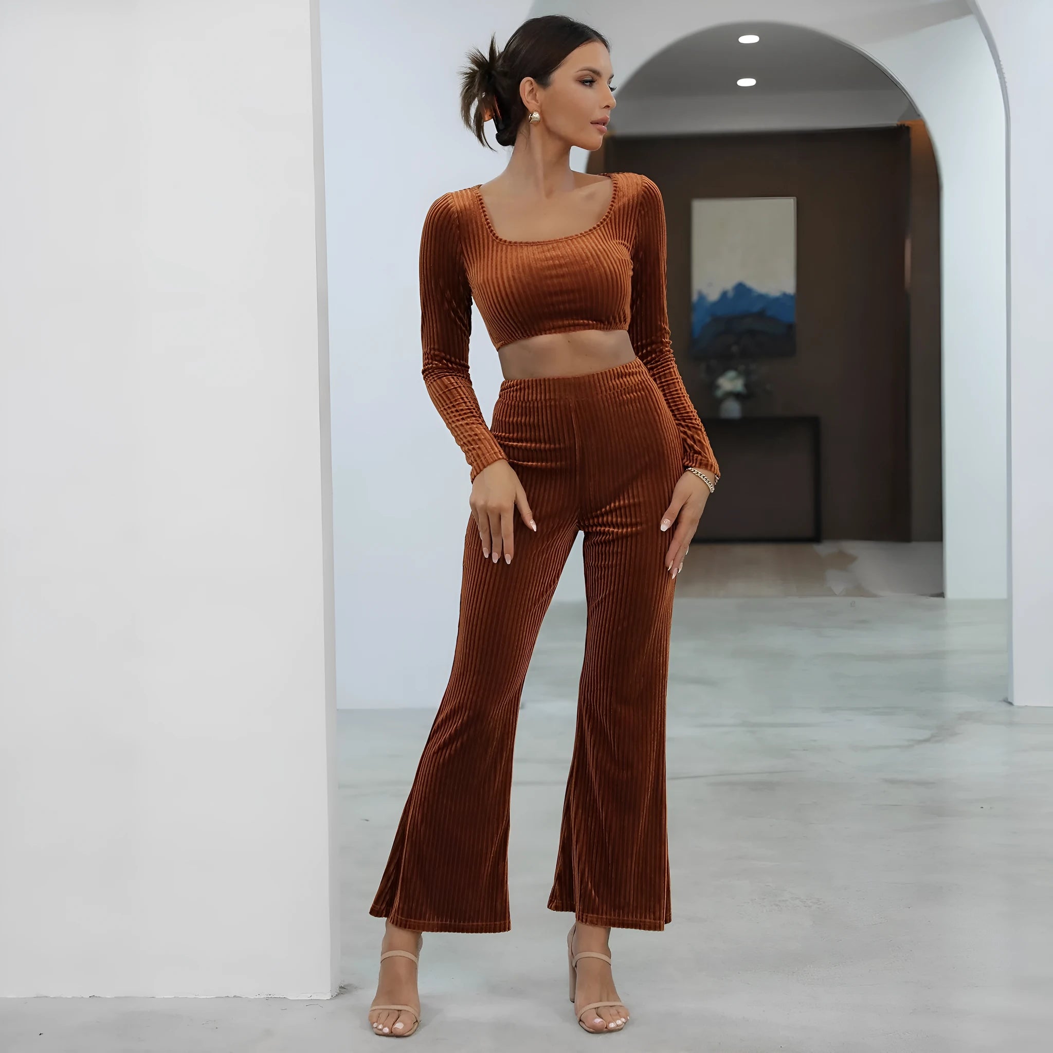 Caramel coloured long sleeve sweater and matching trousers casual set laid flat