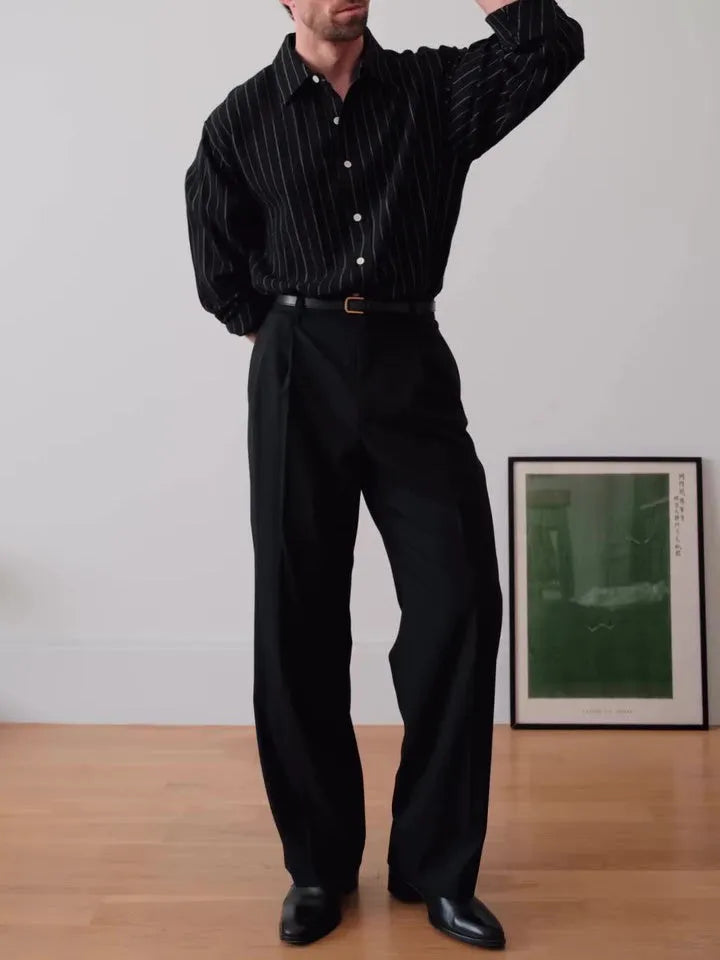 Men's black pinstriped button-down shirt with a regular fit collar on a hanger.