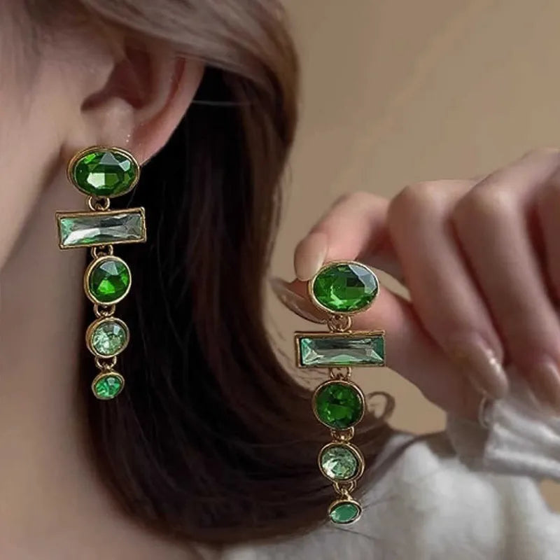 A pair of green gradient geometric Chinese style alloy earrings with inlaid zircon stones.