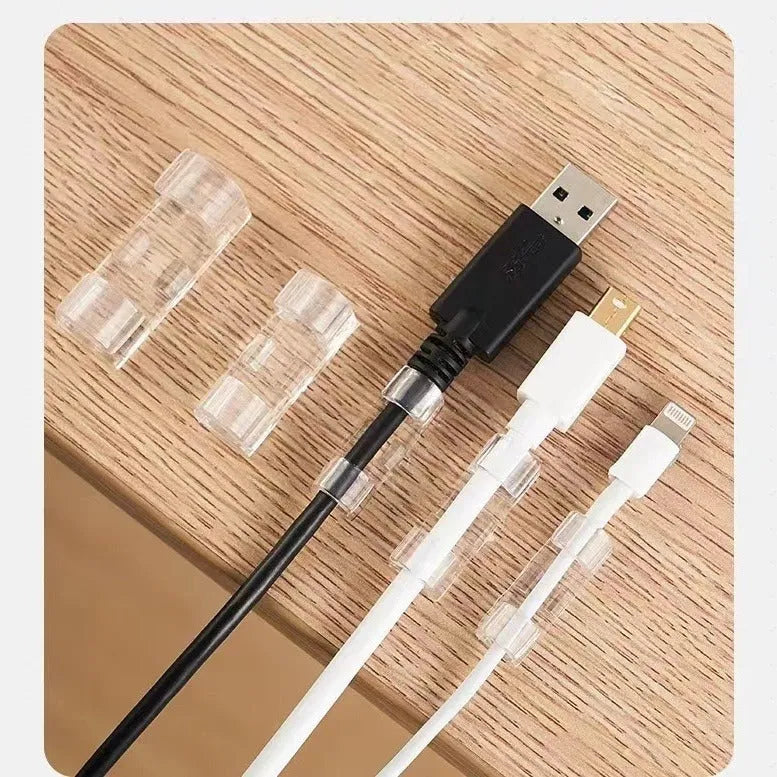 Transparent self-adhesive plastic cable clips in four sizes for wire organisation