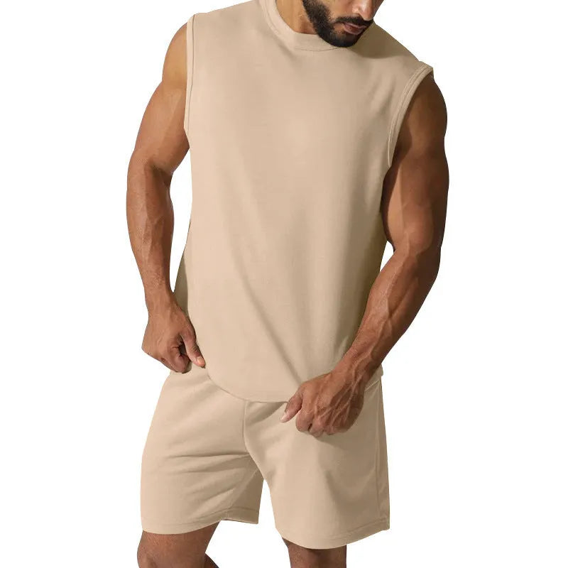 Men's sleeveless cotton blend sports top and matching casual shorts set in army green.