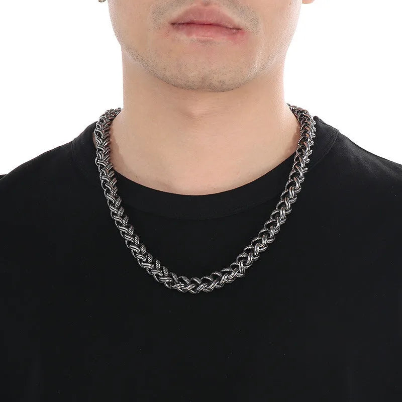 Men's titanium steel keel chain necklace in antique silver with large hemp flowers chain and geometric design.