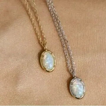 Oval S925 silver pendant necklace with a round jelly opal, shown in both gold tone and white gold tone finishes.
