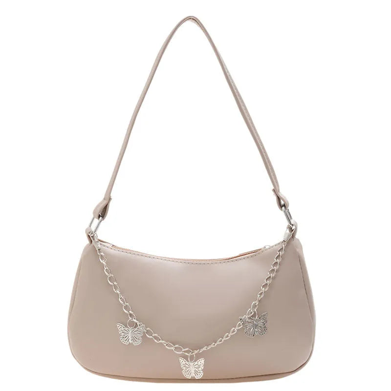 Horizontal square PU crossbody bag with chain strap in retro style showing internal phone and document pockets.